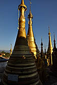 Inle Lake Myanmar. Indein, on the summit of a hill the  Shwe Inn Thein Paya a cluster of hundreds of ancient stupas. Many of them are ruined and overgrown with bushes. 
